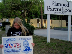 Caitlyn praying outside an abortion clinic in Jax, FL